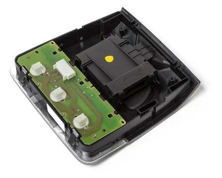 Plastic electronic control unit with black and blue connectors on a white iso Stock Photos