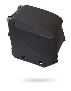 Plastic element of car interior is covered in black trim - armrest or a glo.. Stock Photos