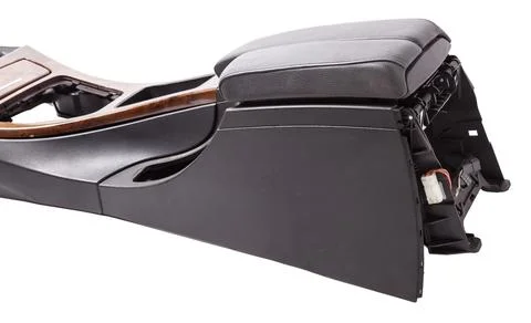 Plastic element of car interior is covered in black leather and wooden - ar.. Stock Photos