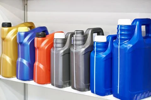 Plastic empty containers for motor oil Stock Photos