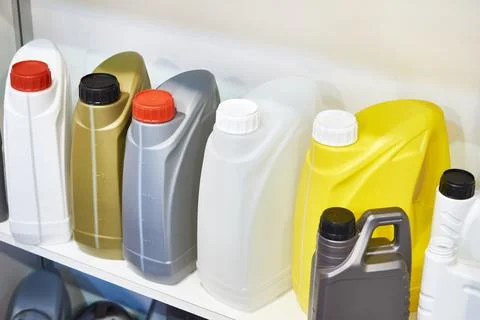 Plastic empty containers for motor oil Stock Photos