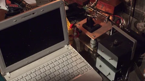 Plastic explosive loaded into laptop computer Stock-Footage 74270437