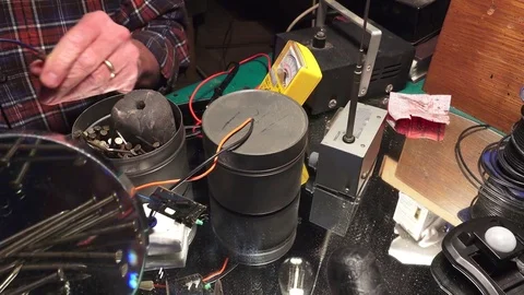 Plastic explosive loaded into laptop computer cutting wire Stock-Footage 74361617