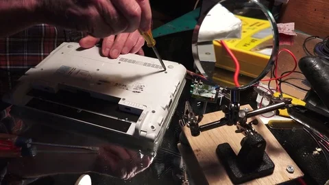 Plastic explosive loaded into laptop computer, high explosive Stock-Footage 74382351