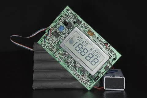 Plastic explosive with timer display with burning fuse as indicator dummy 스톡 사진