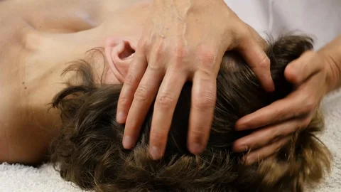 Plastic face massage in spa saton. woman enjoys the services of a professional Video stock 91583194