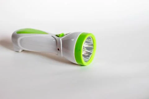 Plastic flashlight isolated on a white background Stock Photos
