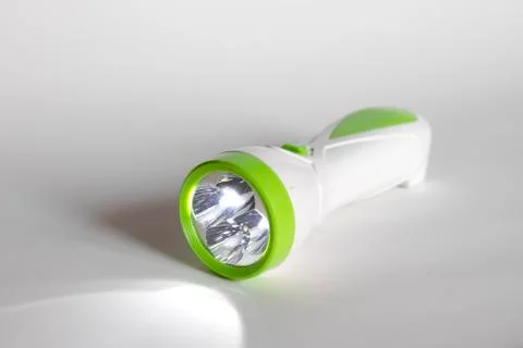 Plastic flashlight isolated on a white background Foto stock