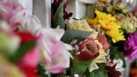 Plastic flowers at the cemetery Stock Footage 116469624