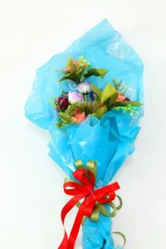 Plastic flowers on a white background. Stock-Fotos