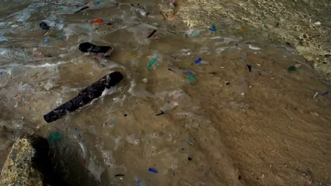 Plastic flowing out to sea, Plastic marine debris. Stock Footage 111745841