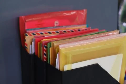 Plastic folder and paper folder, in black bindek Stock Photos