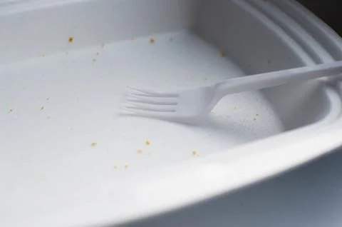 Plastic fork in empty white foam box for food Stock Photos
