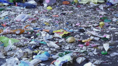 Plastic fragments lying on the ground Stock Footage 263611882