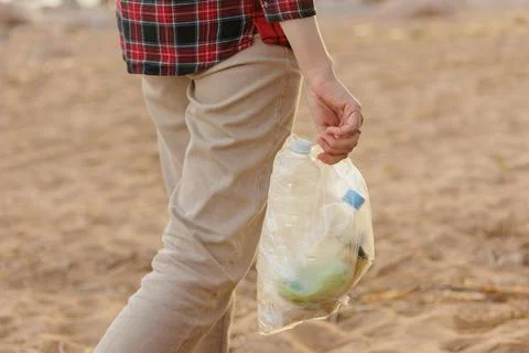 Plastic garbage on the beach, environmental pollution. climate change and global Stock Photos