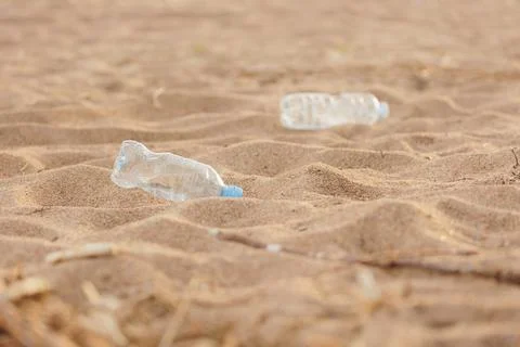 Plastic garbage on the beach, environmental pollution. climate change and global Stock Photos