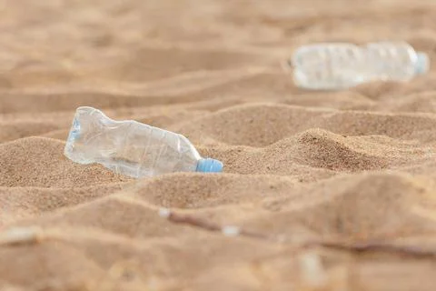 Plastic garbage on the beach, environmental pollution. climate change and global Stock Photos