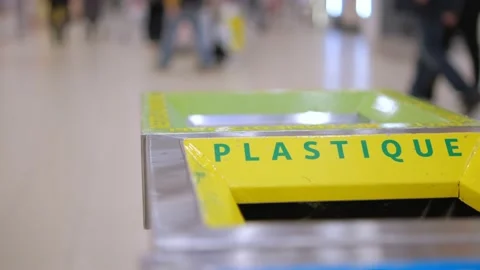 Plastic garbage bin trash container. Human waste recycling can. hand throwing in Stock Footage 236348265