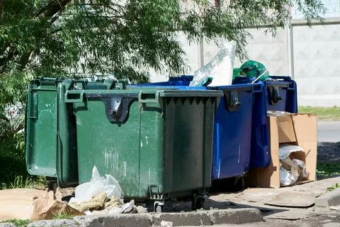 Plastic garbage cans are on the site Stock Photos