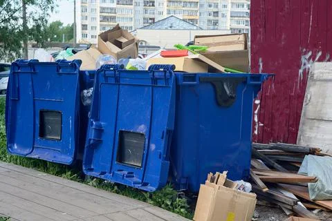 Plastic garbage cans are on the site Stock Photos