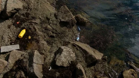 Plastic garbage container floating on dirty ocean sea water,planet pollution Stock Footage 109363392