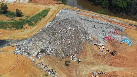 Plastic garbage dumped at landfill 스톡 동영상 115687958