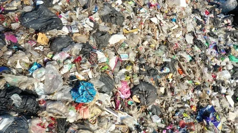 Plastic garbage dumped at landfill Stock-Footage 122994614