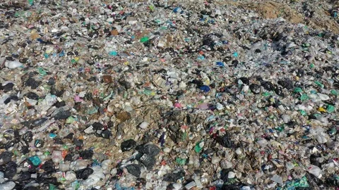 Plastic garbage dumped at landfill Stock Footage 123387681