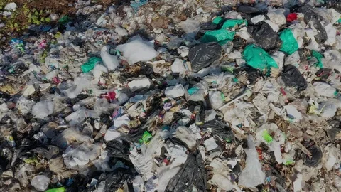 Plastic garbage dumped at landfill Stock Footage 123415303