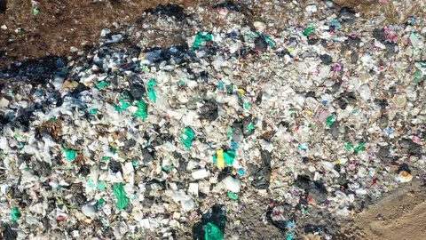 Plastic garbage dumped at landfill Stock Footage 123905678
