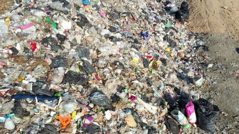 Plastic garbage dumped at landfill Stock Footage 123905697