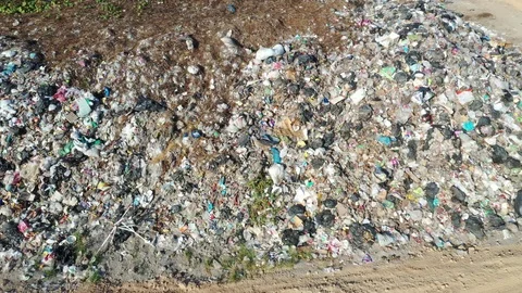 Plastic garbage dumped at landfill Stock Footage 124395243