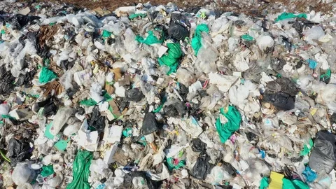 Plastic garbage dumped at landfill Stock Footage 124566026