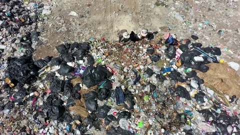 Plastic garbage dumped at landfill Stock Footage 124625637