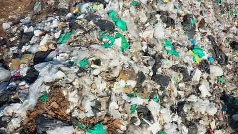 Plastic garbage dumped at landfill Stock Footage 124699570