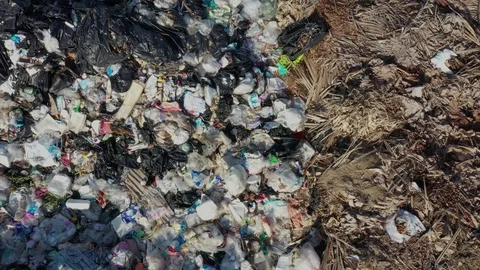 Plastic garbage dumped at landfill Stock Footage 124699574