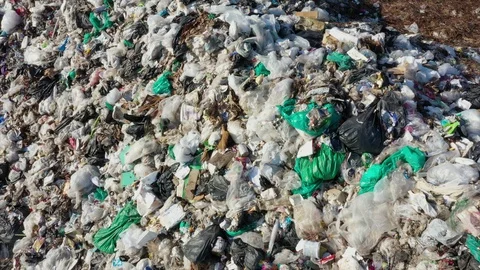 Plastic garbage dumped at landfill Stock Footage 124899259