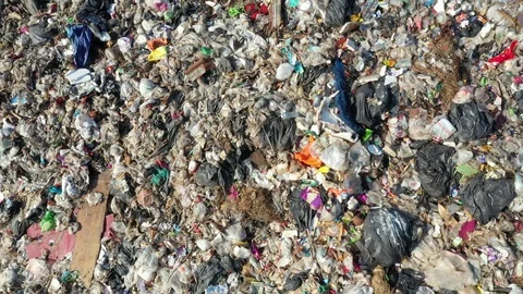 Plastic garbage dumped at landfill Stock Footage 124899262