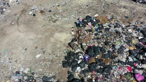Plastic garbage dumped at landfill Stock Footage 125007070