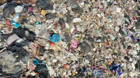 Plastic garbage dumped at landfill Stock Footage 125018227