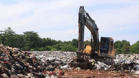 Plastic garbage dumped at landfill Stock Footage 128428933