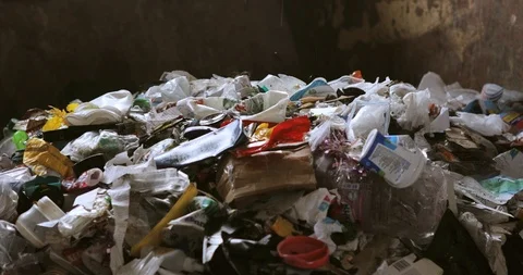 Plastic garbage falling in container to transportation and waste processing. Stock-Footage 120122584
