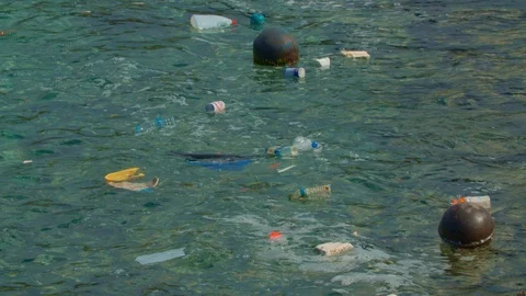 Plastic garbage floating in the ocean in Okinawa Japan Stock Footage 124396466