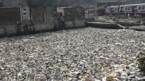 Plastic Garbage in Nala Stock Footage 124568415