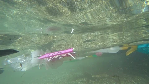 Plastic garbage pollution on sea 2 Stock Footage 113678472