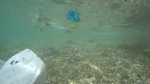 Plastic garbage pollution on sea 3 Stock Footage 113680599