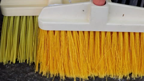 Plastic garden or outdoor push broom with handle for sale Stock Footage 253384598
