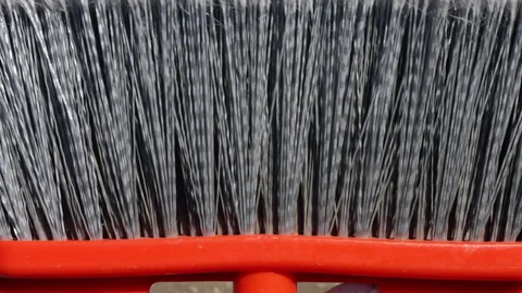 Plastic garden or outdoor push broom with handle for sale Stock Footage 253385278