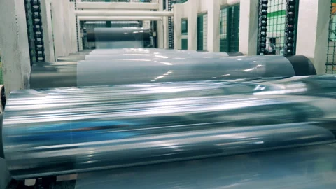 Plastic is getting transported by a rolling mechanism Stock Footage 149738721