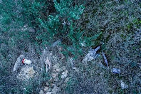 Plastic glass garbage polluting environment in nature Photos